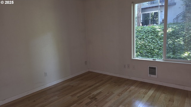 1040 Columbia Ridge Dr Unit 1, Vancouver, WA 98664 - spare room featuring baseboards and wood finished floors
