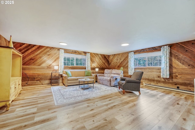 living room with light wood-style floors and wooden walls