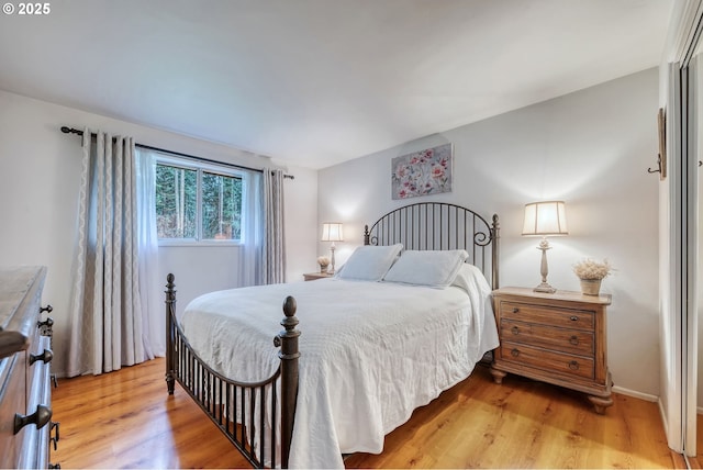 bedroom with light wood-type flooring