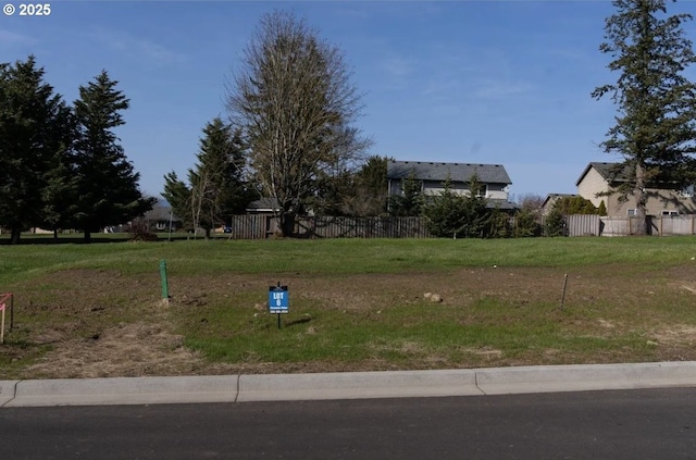 view of yard featuring fence