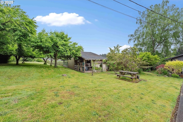 93648 W Mill Ln, Coos Bay, OR 97420 - view of grassy yard featuring exterior structure and an outbuilding
