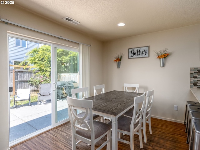 13012 NE 115th St, Vancouver, WA 98682 - dining room with wood finished floors, recessed lighting, baseboards, and a textured ceiling