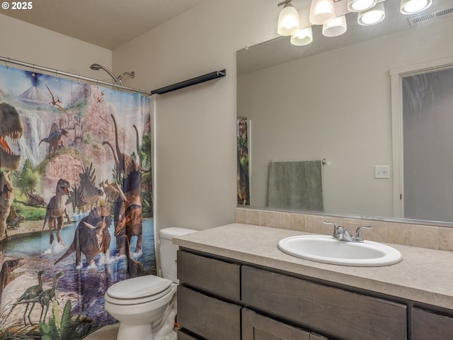 13012 NE 115th St, Vancouver, WA 98682 - bathroom featuring vanity, toilet, and curtained shower