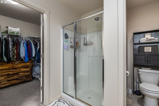 13012 NE 115th St, Vancouver, WA 98682 - full bathroom featuring a stall shower, toilet, and a spacious closet