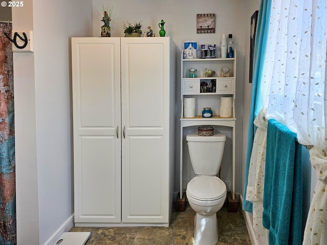 bathroom featuring toilet