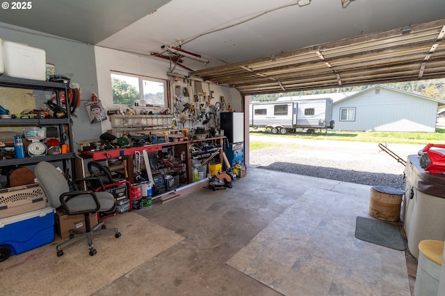 garage featuring a workshop area