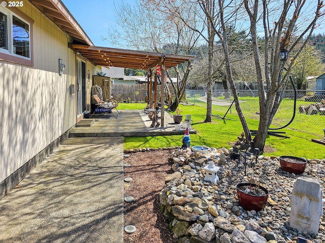 view of yard featuring a pergola and a patio area