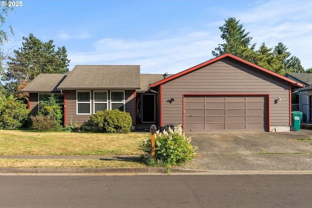 2012 SE Evans Ave, Troutdale, OR 97060 - view of front facade featuring an attached garage, a front yard, concrete driveway, and a shingled roof