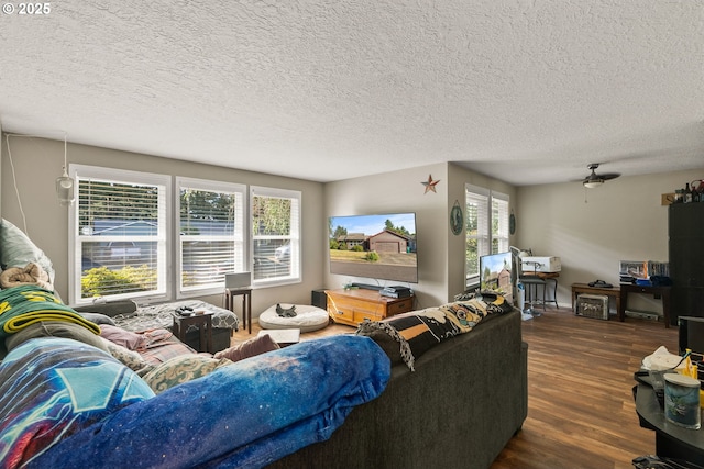 2012 SE Evans Ave, Troutdale, OR 97060 - living area with dark wood-style floors and a textured ceiling