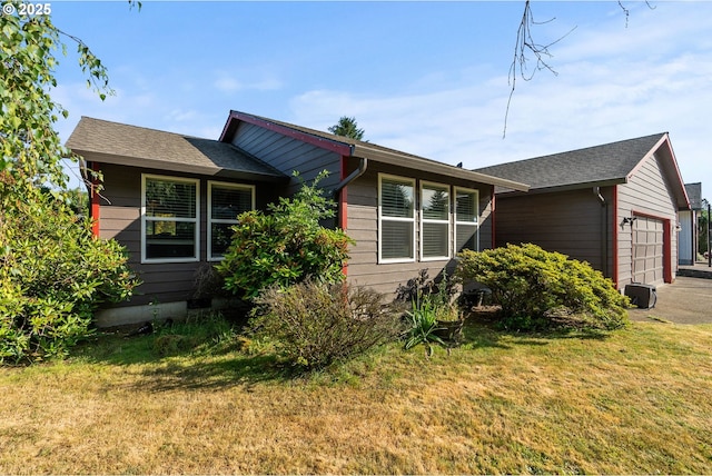 2012 SE Evans Ave, Troutdale, OR 97060 - view of front of property with an attached garage, a front yard, and driveway