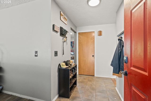 2012 SE Evans Ave, Troutdale, OR 97060 - entrance foyer featuring a textured ceiling and baseboards