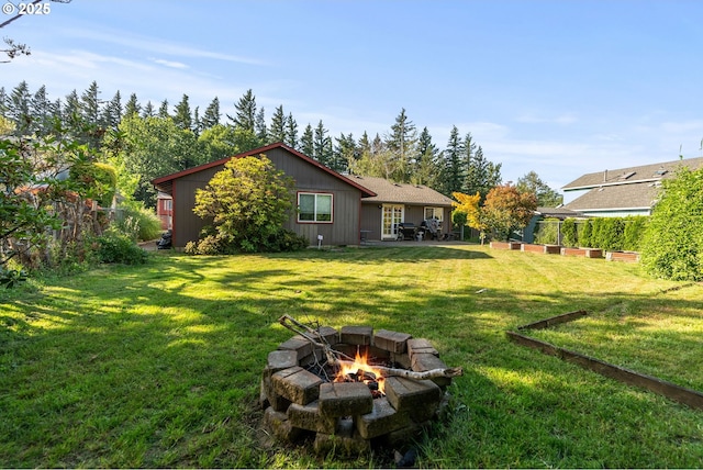 2012 SE Evans Ave, Troutdale, OR 97060 - view of grassy yard with a fire pit