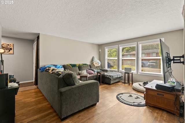 2012 SE Evans Ave, Troutdale, OR 97060 - living room with wood finished floors and a textured ceiling