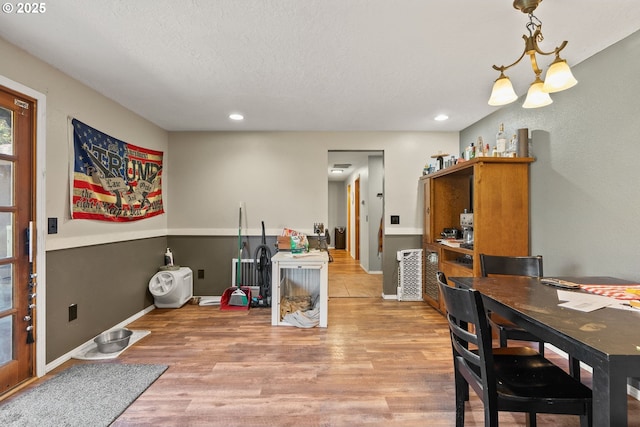 2012 SE Evans Ave, Troutdale, OR 97060 - dining space featuring light wood-style floors, a chandelier, recessed lighting, and a textured ceiling