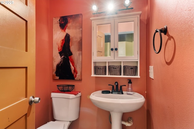 half bathroom with toilet