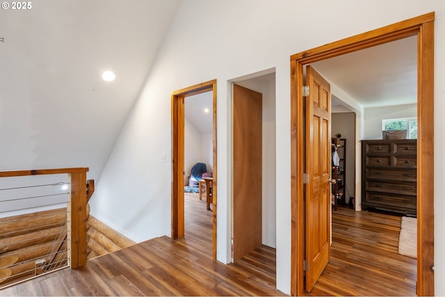 additional living space with recessed lighting, wood finished floors, and vaulted ceiling