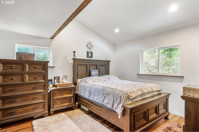 bedroom featuring light wood-style floors, recessed lighting, and vaulted ceiling