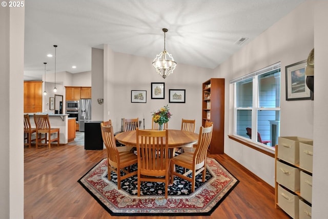 5030 Heceta Park Way, Florence, OR 97439 - dining space with wood finished floors, a chandelier, and recessed lighting