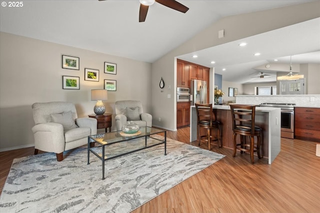 1613 SE Solomon Loop, Vancouver, WA 98683 - living room with a ceiling fan, lofted ceiling, light wood finished floors, and recessed lighting