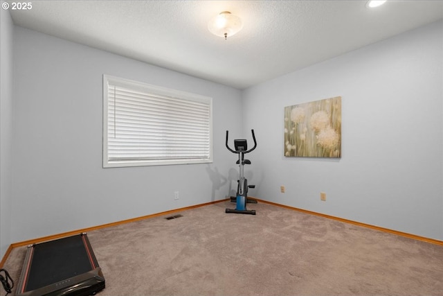 1613 SE Solomon Loop, Vancouver, WA 98683 - exercise room featuring carpet flooring and baseboards