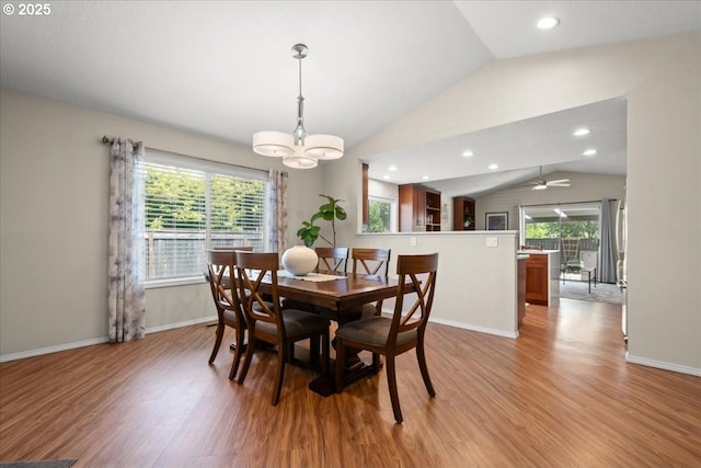 1613 SE Solomon Loop, Vancouver, WA 98683 - dining area with lofted ceiling, light wood-style flooring, recessed lighting, and a chandelier