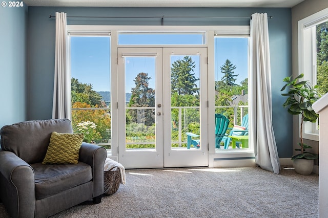 entryway featuring french doors and carpet flooring