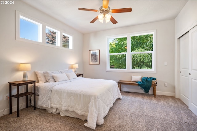 bedroom featuring carpet flooring, a closet, and ceiling fan