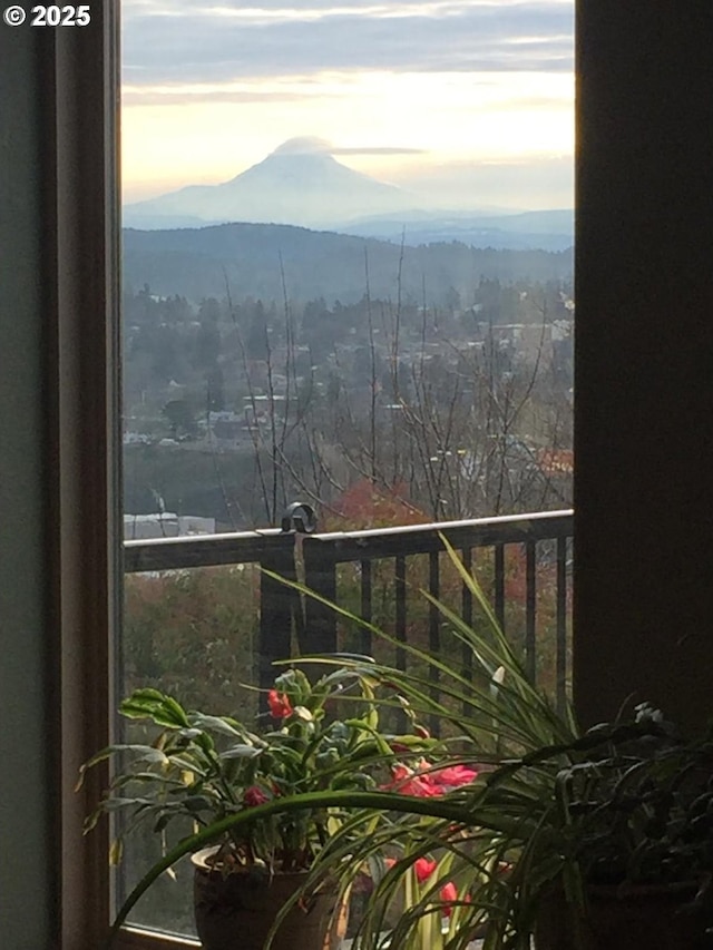 balcony featuring a mountain view