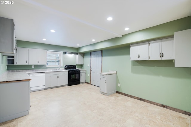 kitchen with black gas range, white cabinets, white dishwasher, a sink, and recessed lighting