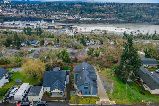 bird's eye view with a water view