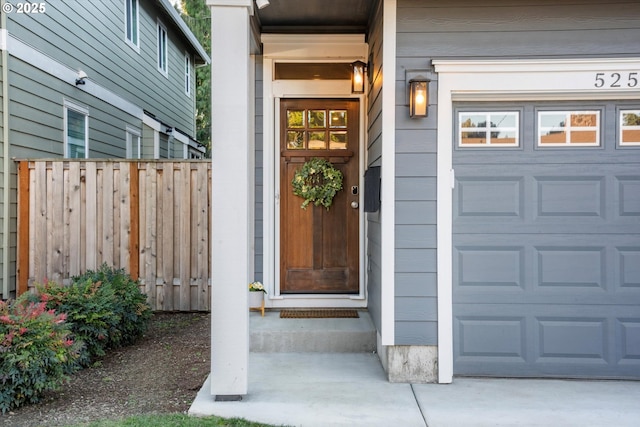 property entrance with a garage