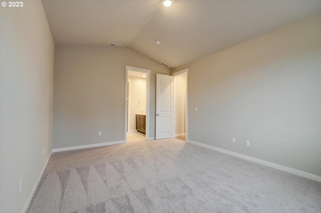 1636 N Millican Crfeek St, Lafayette, OR 97127 - unfurnished bedroom featuring vaulted ceiling, light carpet, baseboards, and ensuite bath