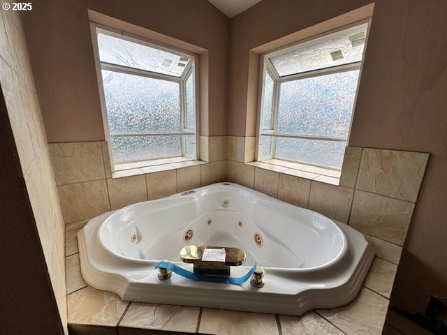 full bath with a tub with jets