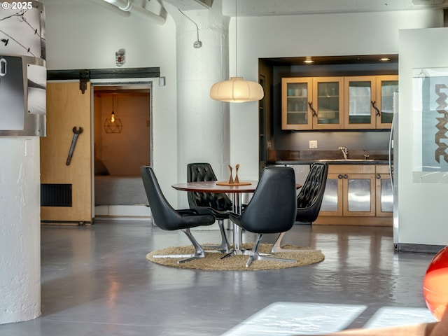 dining area featuring sink