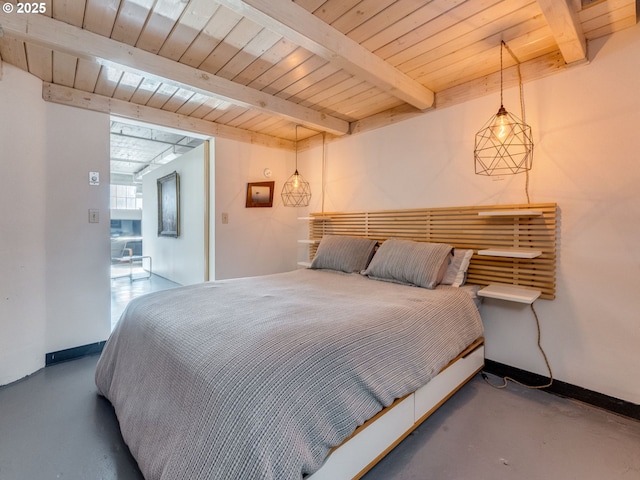 bedroom featuring concrete flooring, beamed ceiling, and wooden ceiling