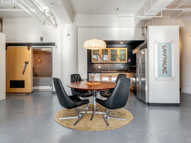 dining space featuring sink