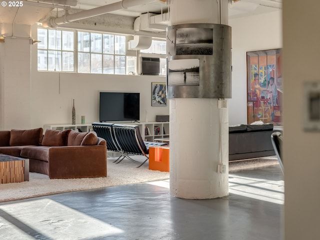 living room with concrete floors