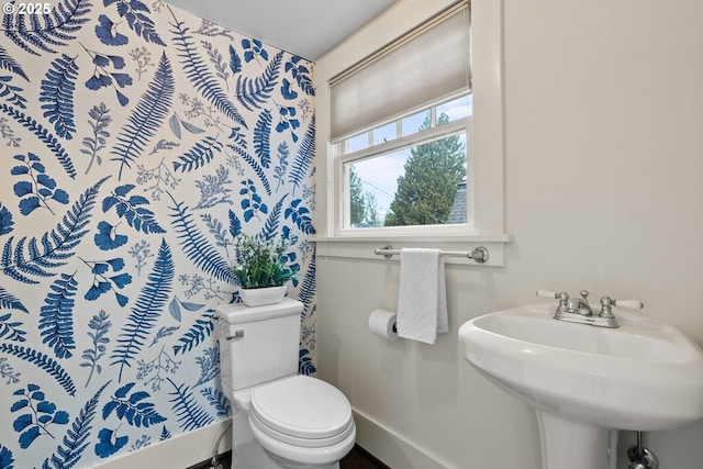 bathroom with toilet and sink