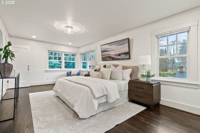 bedroom with dark wood-type flooring