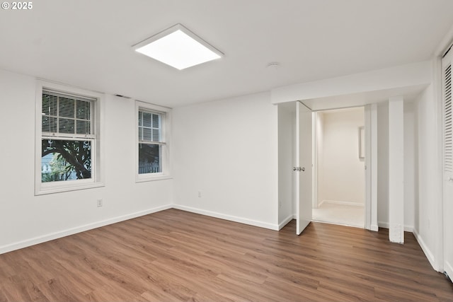 empty room featuring hardwood / wood-style floors