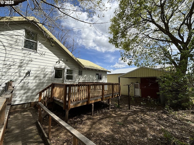 410 Division St, Elgin, OR 97827 - wooden deck featuring an outdoor structure