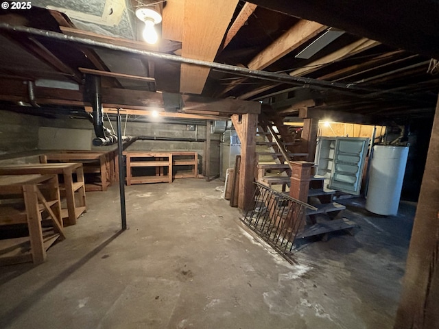 410 Division St, Elgin, OR 97827 - unfinished below grade area with stairway and gas water heater