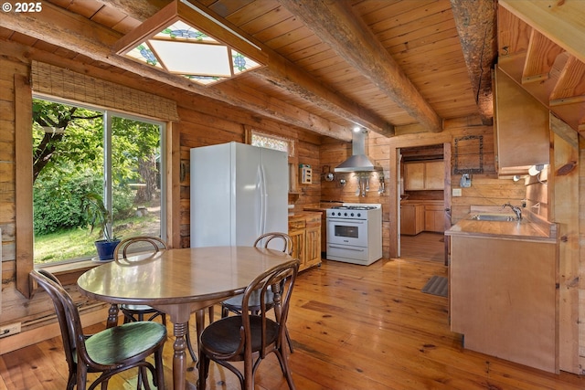 35912 Valley View Ln, Halfway, OR 97834 - dining space with light wood finished floors, wood ceiling with exposed beams, and a skylight