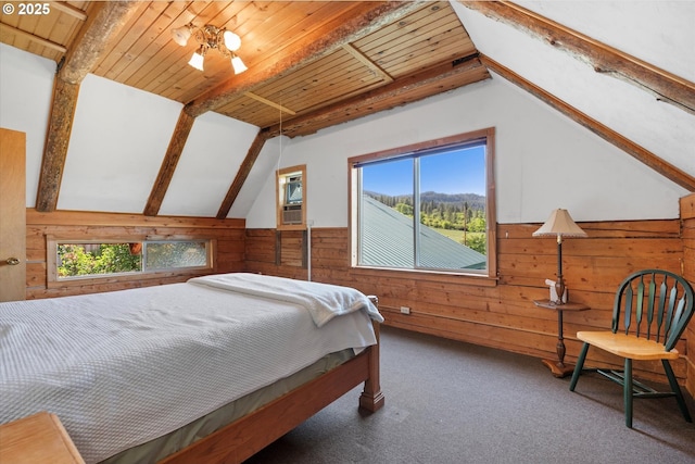 35912 Valley View Ln, Halfway, OR 97834 - bedroom with wooden walls, multiple windows, carpet floors, a wainscoted wall, and wooden ceiling