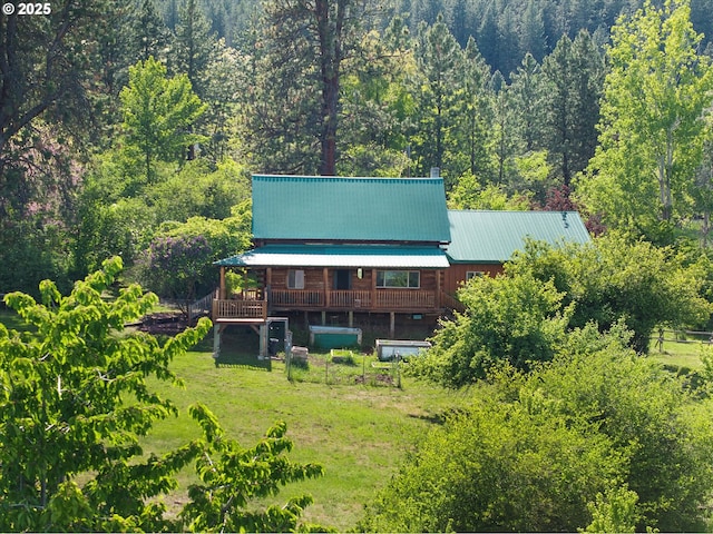 35912 Valley View Ln, Halfway, OR 97834 - back of house featuring a forest view, metal roof, and a wooden deck