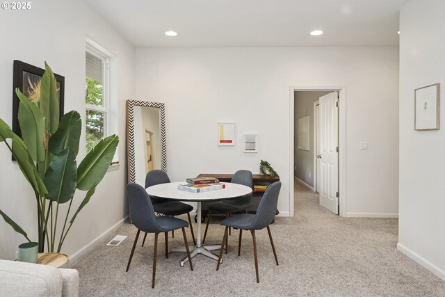 dining space featuring carpet floors, recessed lighting, and baseboards