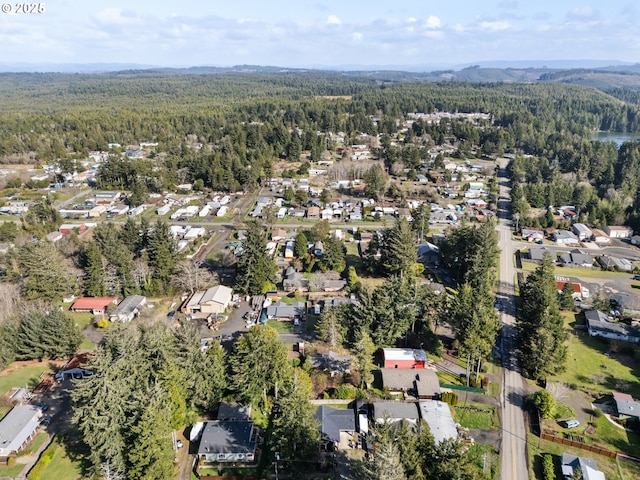 aerial view featuring a view of trees