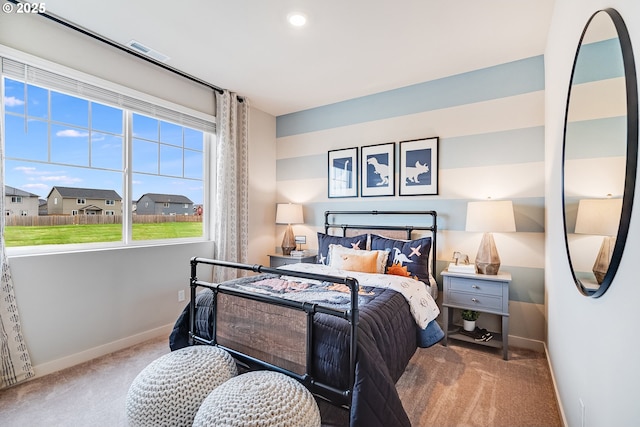 bedroom featuring carpet, visible vents, and baseboards