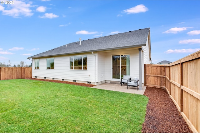 back of house with a fenced backyard, a shingled roof, a lawn, and a patio