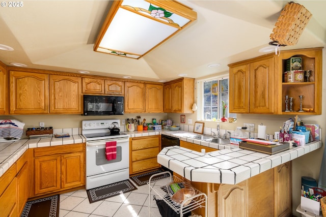 kitchen featuring a sink, white electric range oven, tile countertops, black microwave, and light tile patterned floors